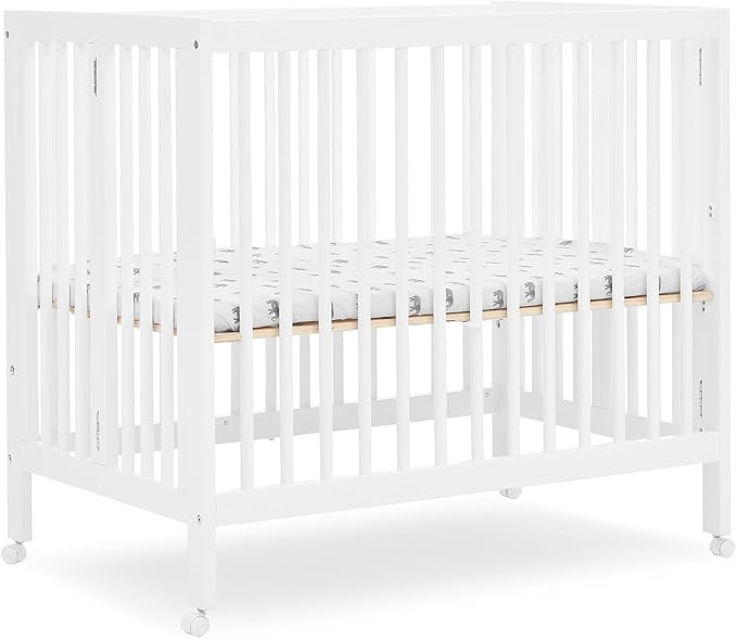 Delta Children Mia Portable Folding Mini Crib with 1.5-Inch Mattress - Greenguard Gold Certified, Bianca White - LeafyLoom