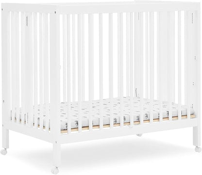 Delta Children Mia Portable Folding Mini Crib with 1.5-Inch Mattress - Greenguard Gold Certified, Bianca White - LeafyLoom