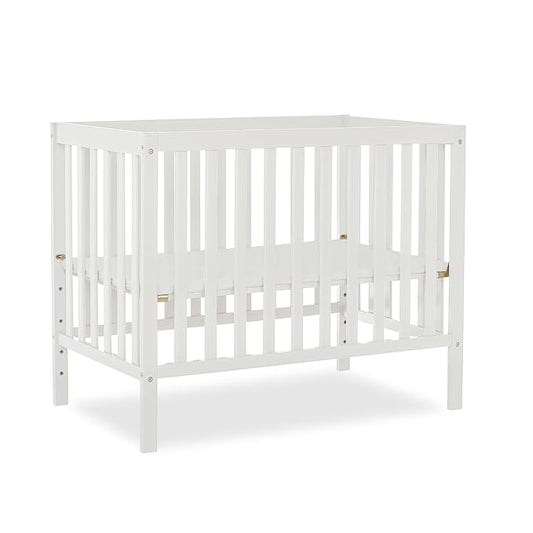 Edgewood 4-In-1 Convertible Mini Crib In White, JPMA Certified, Non-Toxic Finish, New Zealand Pinewood, With 3 Mattress Height Settings, Included 1" Mattress Pad - LeafyLoom