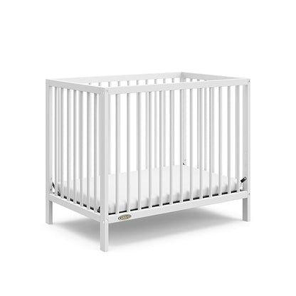 Graco Teddi 4-in-1 Convertible Mini Crib with Bonus Water-Resistant Mattress (White) – GREENGUARD Gold Certified, 2.75-Inch Mattress Included, Convenient Size, Easy 30-Minute Assembly - LeafyLoom