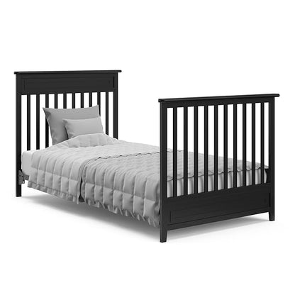 Storkcraft Petal 4-in-1 Convertible Mini Crib (Black) – GREENGUARD Gold Certified, Converts to Daybed and Twin-Size Bed, includes Bonus 2.75-inch Mini Crib Mattress - LeafyLoom