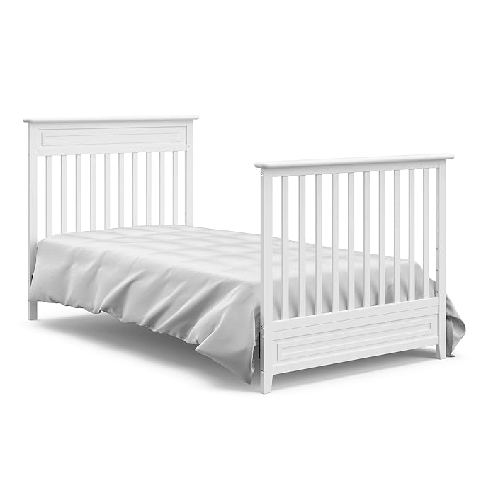 Storkcraft Petal 4-in-1 Convertible Mini Crib (White) – GREENGUARD Gold Certified, Converts to Daybed and Twin-Size Bed, Includes Bonus 2.75-inch Mini Crib Mattress, Mini Crib with Mattress Included - LeafyLoom