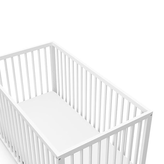 Graco Teddi 5-in-1 Convertible Crib (White) – GREENGUARD Gold Certified, Converts to Daybed, Toddler & Twin Bed with Headboard and Footboard, Adjustable Mattress Height - LeafyLoom