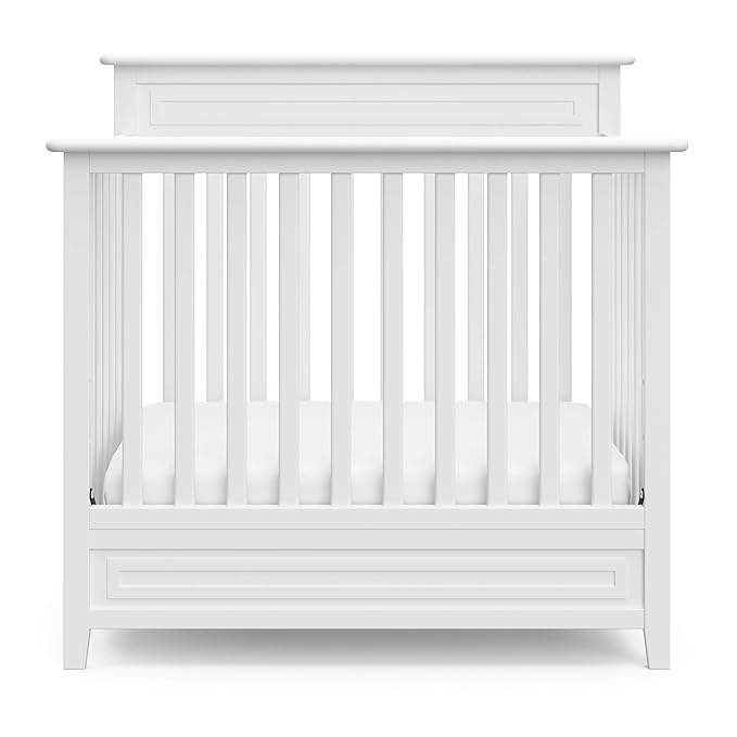 Storkcraft Petal 4-in-1 Convertible Mini Crib (White) – GREENGUARD Gold Certified, Converts to Daybed and Twin-Size Bed, Includes Bonus 2.75-inch Mini Crib Mattress, Mini Crib with Mattress Included - LeafyLoom