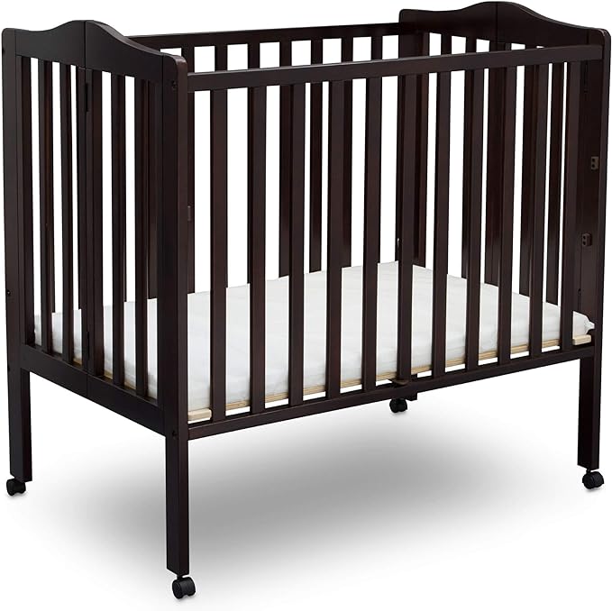 Delta Children Folding Portable Mini Baby Crib with 1.5-inch Mattress, Dark Chocolate - LeafyLoom