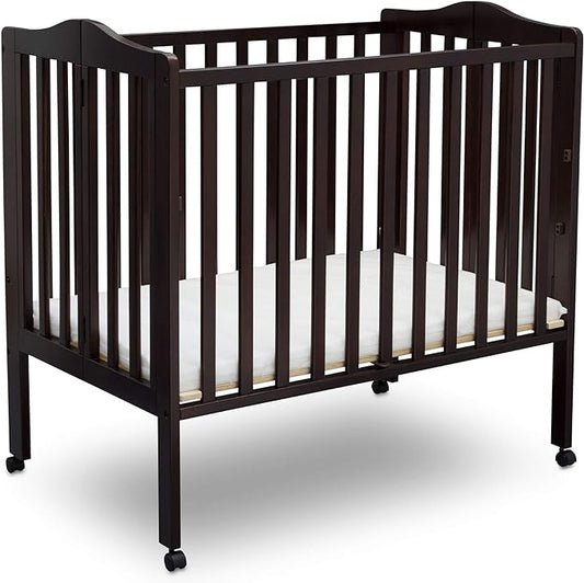 Delta Children Folding Portable Mini Baby Crib with 1.5-inch Mattress, Dark Chocolate - LeafyLoom