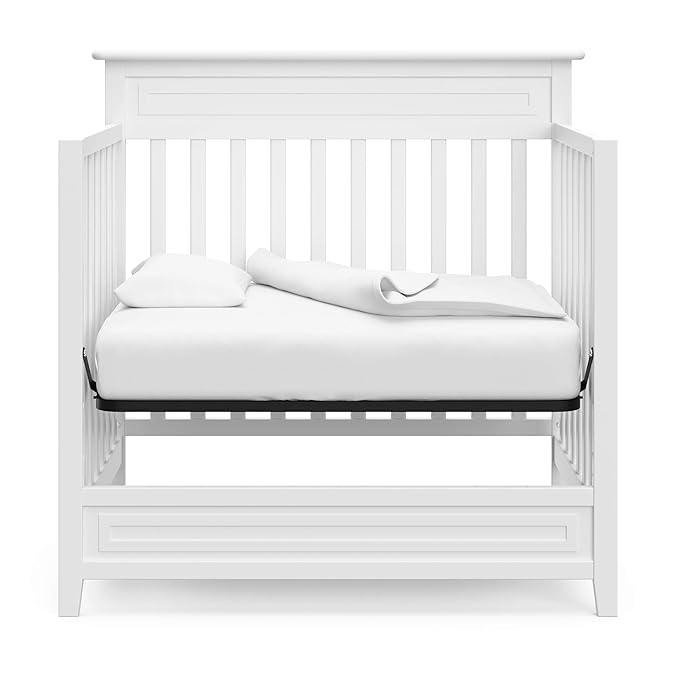 Storkcraft Petal 4-in-1 Convertible Mini Crib (White) – GREENGUARD Gold Certified, Converts to Daybed and Twin-Size Bed, Includes Bonus 2.75-inch Mini Crib Mattress, Mini Crib with Mattress Included - LeafyLoom