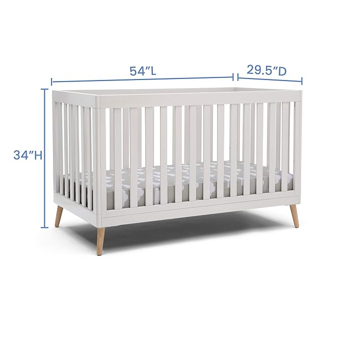 Delta Children Essex 4-in-1 Convertible Baby Crib, Bianca White with Natural Legs + Delta Children Twinkle Galaxy Dual Sided Recycled Fiber Core Crib and Toddler Mattress (Bundle) - LeafyLoom