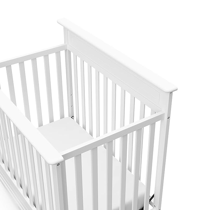 Storkcraft Petal 4-in-1 Convertible Mini Crib (White) – GREENGUARD Gold Certified, Converts to Daybed and Twin-Size Bed, Includes Bonus 2.75-inch Mini Crib Mattress, Mini Crib with Mattress Included - LeafyLoom