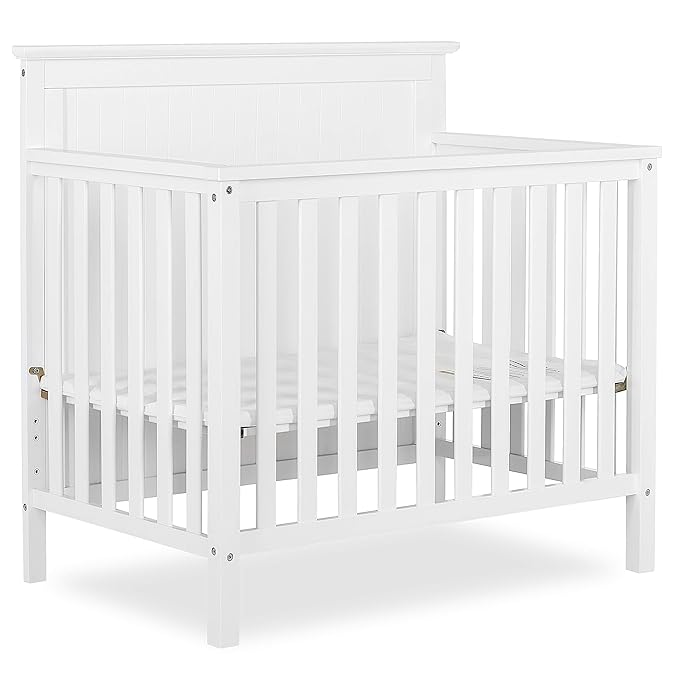 Ava 4-in-1 Convertible Mini Crib in White, Greenguard Gold Certified, Non-Toxic Finish, Comes with 1" Mattress Pad, with 3 Mattress Height Settings - LeafyLoom