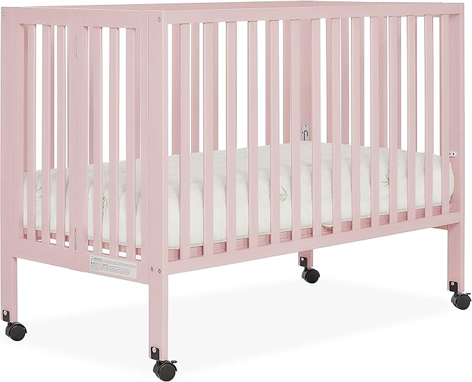 Quinn Full-Size Folding Crib in Blush Pink, Removeable Wheels, Modern Nursey, Adjustable Mattress Support, Portable Crib, Patented Folding System - LeafyLoom