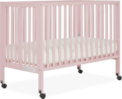 Quinn Full-Size Folding Crib in Blush Pink, Removeable Wheels, Modern Nursey, Adjustable Mattress Support, Portable Crib, Patented Folding System - LeafyLoom