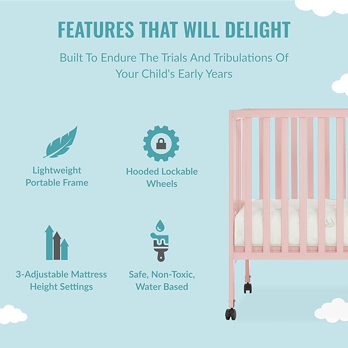 Quinn Full-Size Folding Crib in Blush Pink, Removeable Wheels, Modern Nursey, Adjustable Mattress Support, Portable Crib, Patented Folding System - LeafyLoom