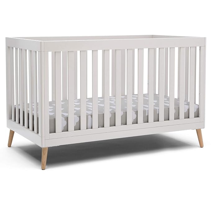 Delta Children Essex 4-in-1 Convertible Baby Crib, Bianca White with Natural Legs - LeafyLoom