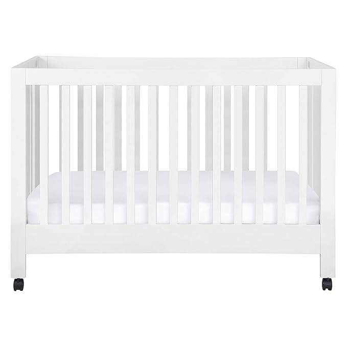 Babyletto Maki Full-Size 2-in-1 Portable Folding Crib with Toddler Bed Conversion Kit in White, Greenguard Gold Certified - LeafyLoom