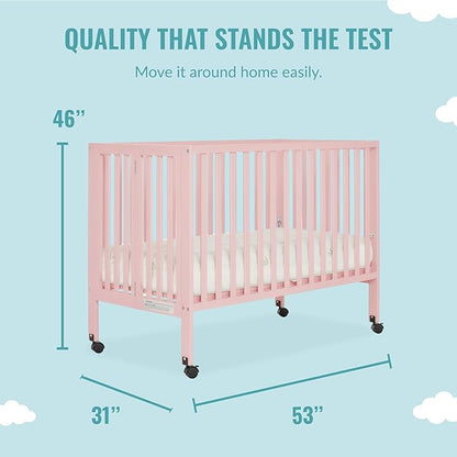 Quinn Full-Size Folding Crib in Blush Pink, Removeable Wheels, Modern Nursey, Adjustable Mattress Support, Portable Crib, Patented Folding System - LeafyLoom