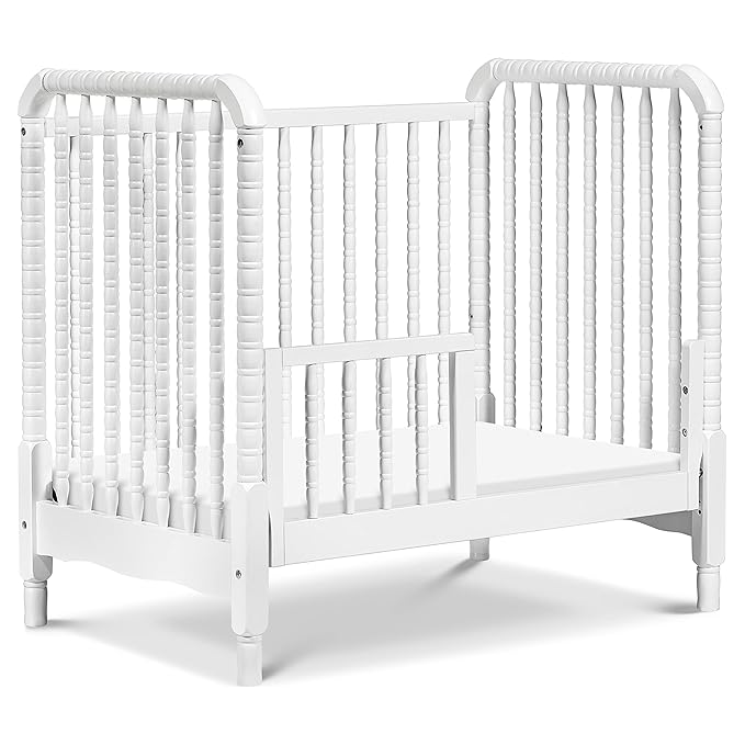 DaVinci Jenny Lind 3-in-1 Convertible Mini Crib in White, Removable Wheels, Greenguard Gold Certified - LeafyLoom