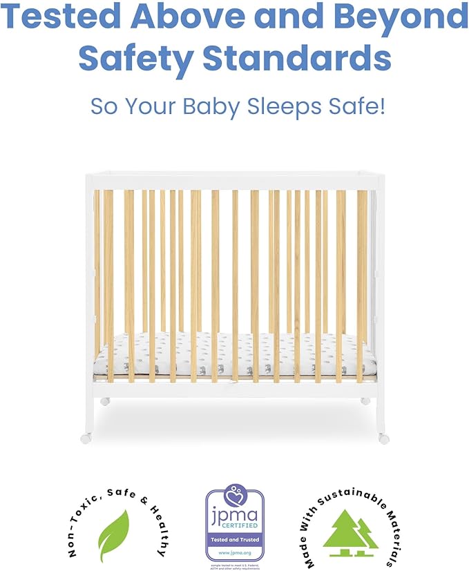 Delta Children Mia Portable Folding Mini Crib with 1.5-Inch Mattress - Greenguard Gold Certified, Bianca White/Natural - LeafyLoom