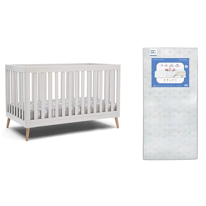 Delta Children Essex 4-in-1 Convertible Baby Crib, Bianca White with Natural Legs + Delta Children Twinkle Galaxy Dual Sided Recycled Fiber Core Crib and Toddler Mattress (Bundle) - LeafyLoom