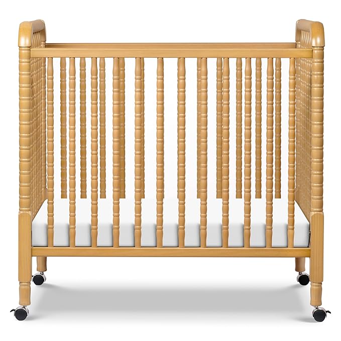 DaVinci Jenny Lind 3-in-1 Convertible Mini Crib in Honey, Removable Wheels, Greenguard Gold Certified - LeafyLoom