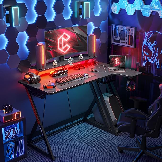 CubiCubi Aurora Gaming Desk with LED Lights & Power Outlets, 40 Inch L Shaped Carbon Fiber Surface Desk with Storage Shelves, Small Corner Computer Desk with Monitor Shelf, Gamer Desk PC Table, Black - LeafyLoom