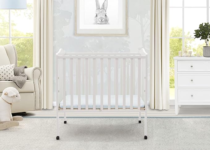 Delta Children Folding Portable Mini Baby Crib with 1.5-inch Mattress - Greenguard Gold Certified, White & Dream On Me Holly 3” Fiber Portable, Greenguard Gold Certified, White - LeafyLoom