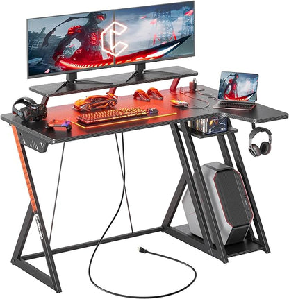 CubiCubi Aurora Gaming Desk with LED Lights & Power Outlets, 40 Inch L Shaped Carbon Fiber Surface Desk with Storage Shelves, Small Corner Computer Desk with Monitor Shelf, Gamer Desk PC Table, Black - LeafyLoom