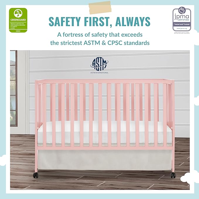 Quinn Full-Size Folding Crib in Blush Pink, Removeable Wheels, Modern Nursey, Adjustable Mattress Support, Portable Crib, Patented Folding System - LeafyLoom