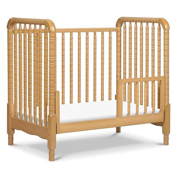 DaVinci Jenny Lind 3-in-1 Convertible Mini Crib in Honey, Removable Wheels, Greenguard Gold Certified - LeafyLoom