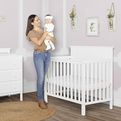 Ava 4-in-1 Convertible Mini Crib in White, Greenguard Gold Certified, Non-Toxic Finish, Comes with 1" Mattress Pad, with 3 Mattress Height Settings - LeafyLoom