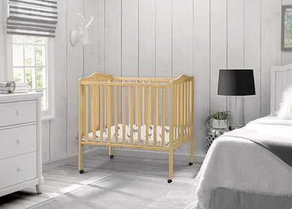 Delta Children Folding Portable Mini Baby Crib with 1.5-inch Mattress - Greenguard Gold Certified, Natural - LeafyLoom