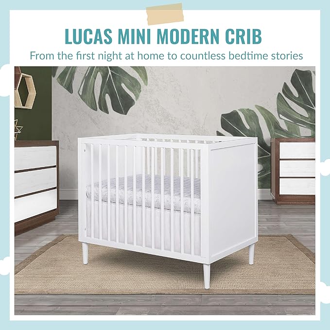 Lucas Mini Modern Crib with Rounded Spindles in White , 39x25.5x33 Inch (Pack of 1) - LeafyLoom