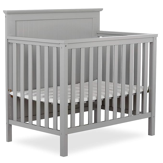 Ava 4-in-1 Convertible Mini Crib in Pebble Grey, 635-PG, Greenguard Gold Certified, Non-Toxic Finish, Comes with 1" Mattress Pad, with 3 Mattress Height Settings - LeafyLoom