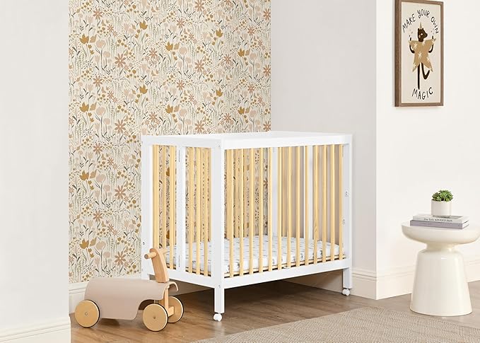 Delta Children Mia Portable Folding Mini Crib with 1.5-Inch Mattress - Greenguard Gold Certified, Bianca White/Natural - LeafyLoom