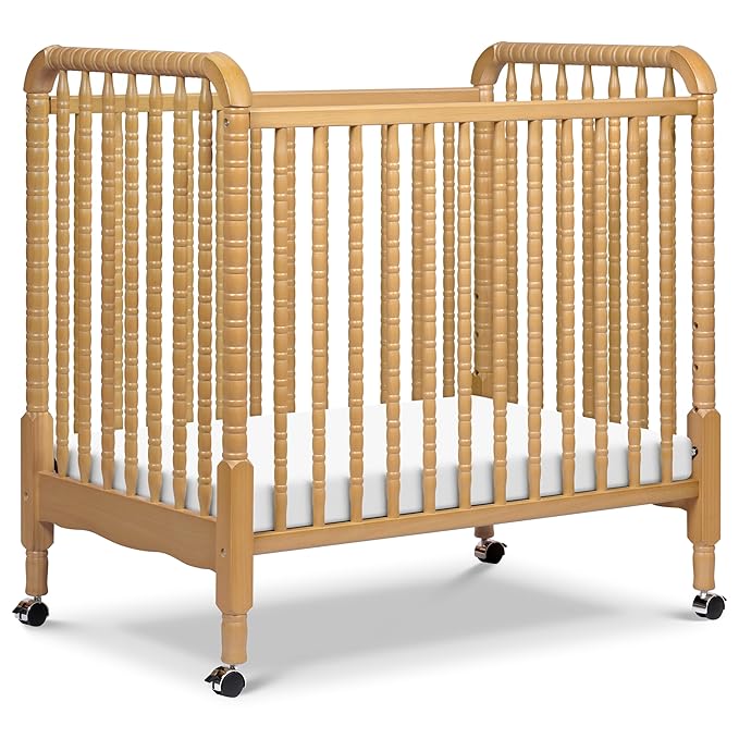 DaVinci Jenny Lind 3-in-1 Convertible Mini Crib in Honey, Removable Wheels, Greenguard Gold Certified - LeafyLoom