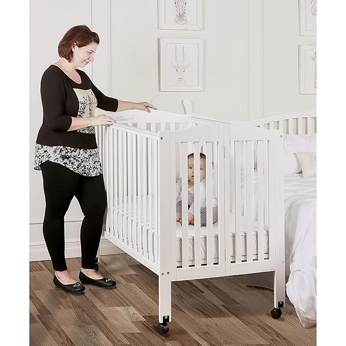 3 in 1 Portable Folding Stationary Side Crib in White, Greenguard Gold Certified, Safety Wheel with Locking Casters, Convertible, 3 Mattress Heights - LeafyLoom