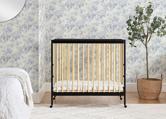 Delta Children Mia Portable Folding Mini Crib with 1.5-Inch Mattress - Greenguard Gold Certified, Ebony Black/Natural - LeafyLoom