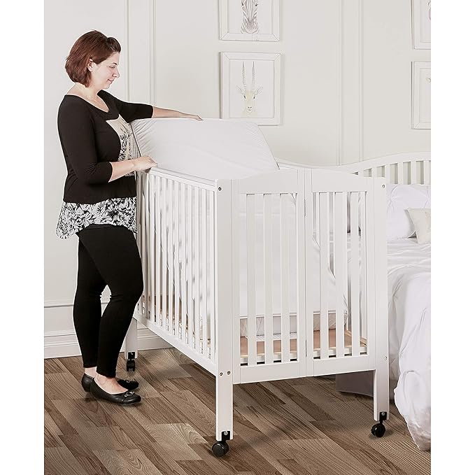 3 in 1 Portable Folding Stationary Side Crib in White, Greenguard Gold Certified, Safety Wheel with Locking Casters, Convertible, 3 Mattress Heights - LeafyLoom